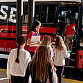 LifeWise’s big red bus is driving thorny questions about church and state