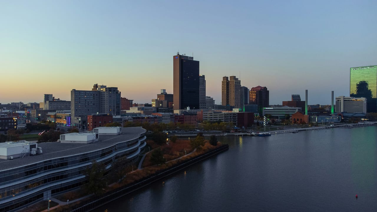 Toledo skyline at dusk along the Maumee River