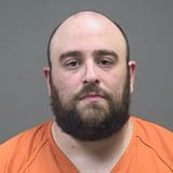 Registered Republican arrested after pushing toward Amy Acton while carrying two guns at Canfield Fair