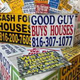 The signs offer quick cash for homes. But states want more oversight.