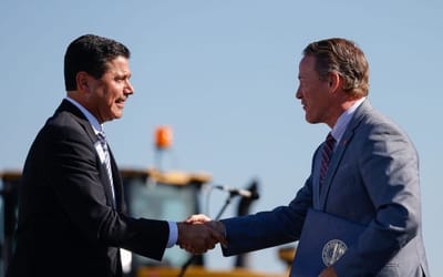 As he worked to advance the Intel project, Jon Husted’s wife was invested in it