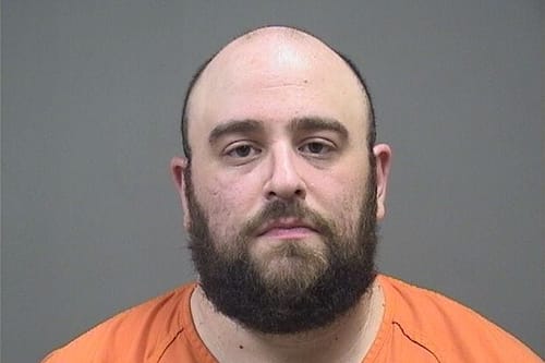 Registered Republican arrested after pushing toward Amy Acton while carrying two guns at Canfield Fair