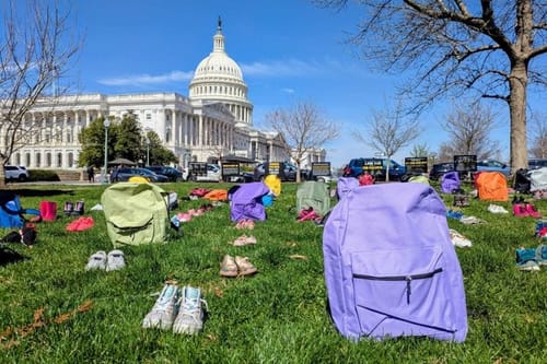Protesters of Iran war spotlight children killed in school bombing