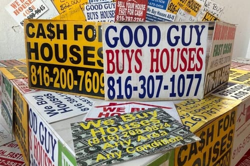 The signs offer quick cash for homes. But states want more oversight.