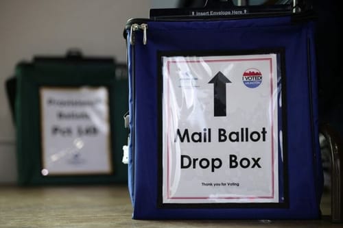 Trump signs order seeking to curb vote-by-mail in bid to control state election laws