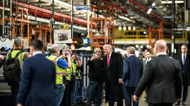 A Ford worker called out Trump. The president flipped him off. Now, he’s been suspended.