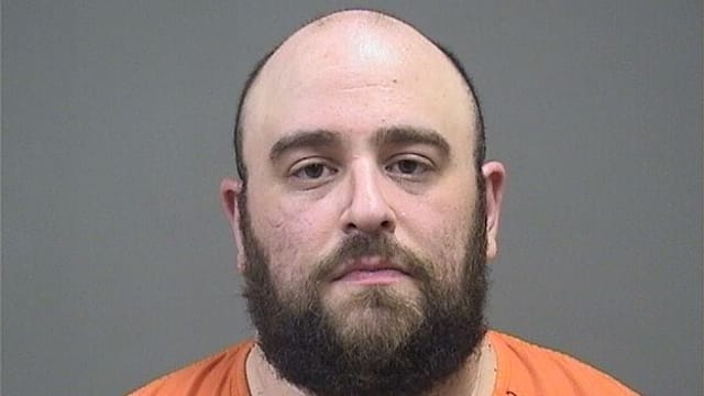 Registered Republican arrested after pushing toward Amy Acton while carrying two guns at Canfield Fair