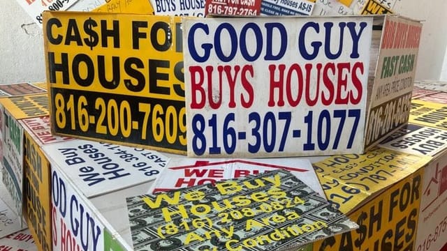 The signs offer quick cash for homes. But states want more oversight.