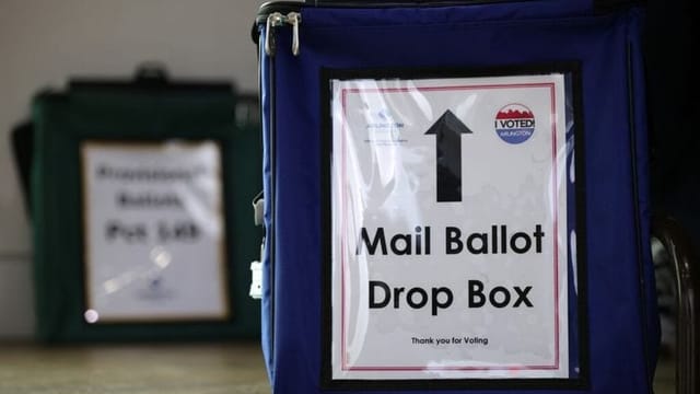 Trump signs order seeking to curb vote-by-mail in bid to control state election laws