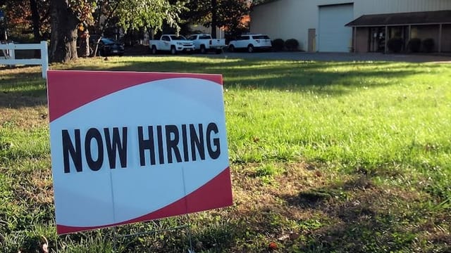 Unemployment ticks down, labor market remains strong, latest numbers show