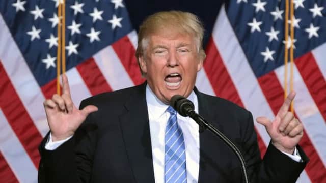 Trump vows new tariffs, attacks Supreme Court justices after ruling