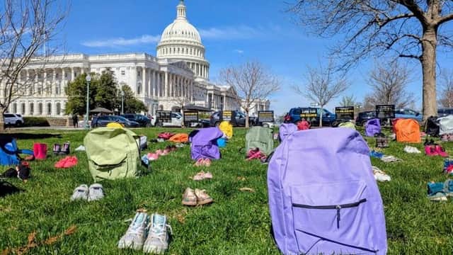 Protesters of Iran war spotlight children killed in school bombing