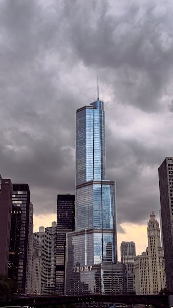 a very tall building towering over a city