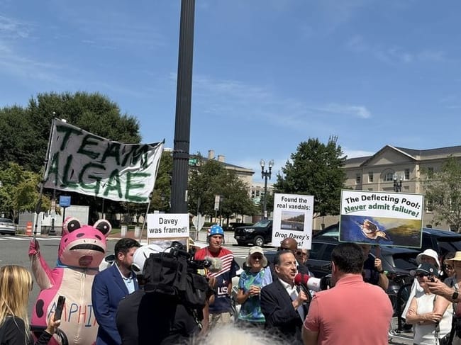 Supporters of Olympian David Hearn of Bethesda, Maryland, who has pleaded not guilty to charges of vandalizing the Lincoln Memorial Reflecting Pool, gather outside District of Columbia Superior Court on Sept. 4, 2026. (Photo by Ariana Figueroa/States Newsroom)