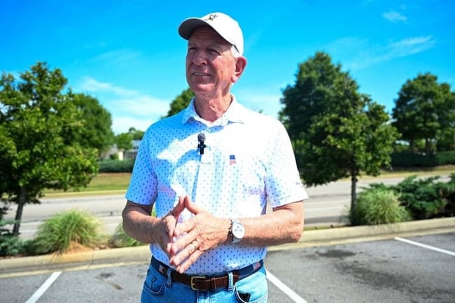 U.S. Sen. Tommy Tuberville, R-Ala., speaks to reporters after voting in the GOP primary in Auburn, Alabama on May 19, 2026. (Photo by Anna Barrett/Alabama Reflector)