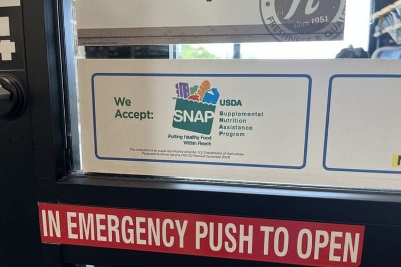 A sign advertises that SNAP benefits are accepted at a grocery store in Fargo, North Dakota, on July 7, 2026. (Photo by Ceilidh Kern for the North Dakota Monitor)
