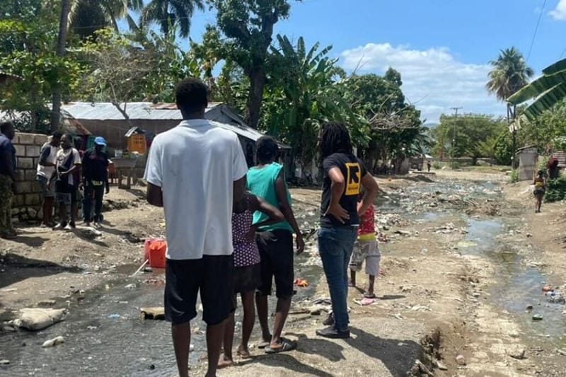 Haitian survivors of Hurricane Melissa in Petit Goave earlier this year. (Photo courtesy of the International Rescue Committee.)