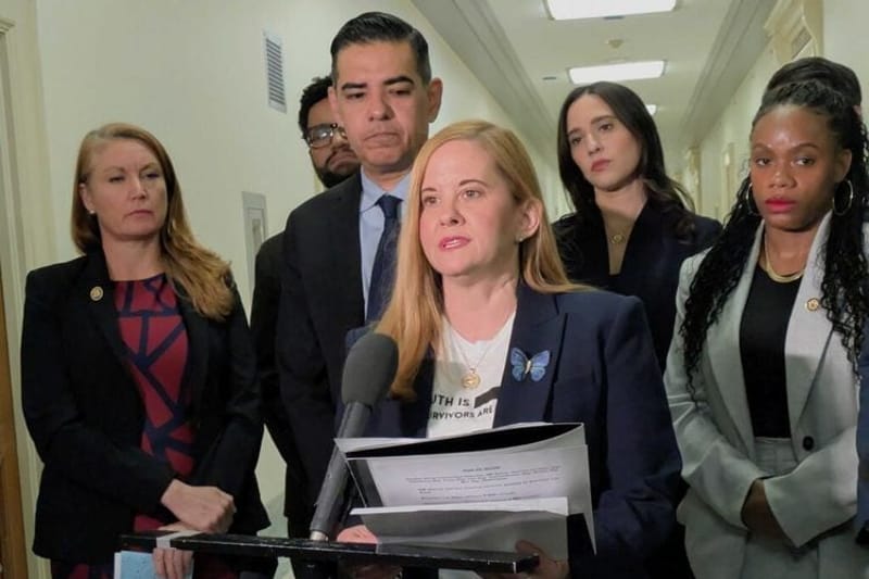 Liz Stein, a sexual abuse survivor advocate who has gone public about abuse by the late Jeffrey Epstein, spoke surrounded by U.S. House Oversight Committee Democrats on Friday, May 29, 2026, in the Rayburn House Office Buildin in Washington, D.C. (Photo by Ashley Murray/States Newsroom)
