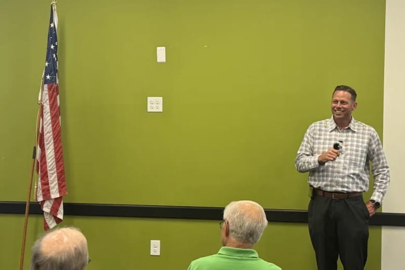 Democratic congressional candidate Brian Poindexter speaks at the Brook Park branch of the Cuyahoga County Public Library on July 1, 2026 as part of a campaign town hall event. Credit: Andrew J. Tobias / Signal Statewide