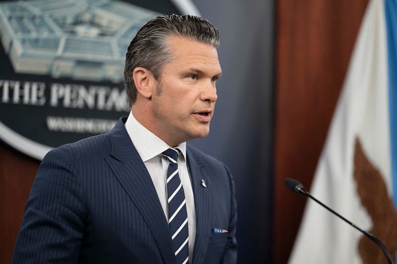 U.S. Secretary of Defense Pete Hegseth speaks during a news conference at the Pentagon in Arlington, Virginia. (Public domain photo by DOD)