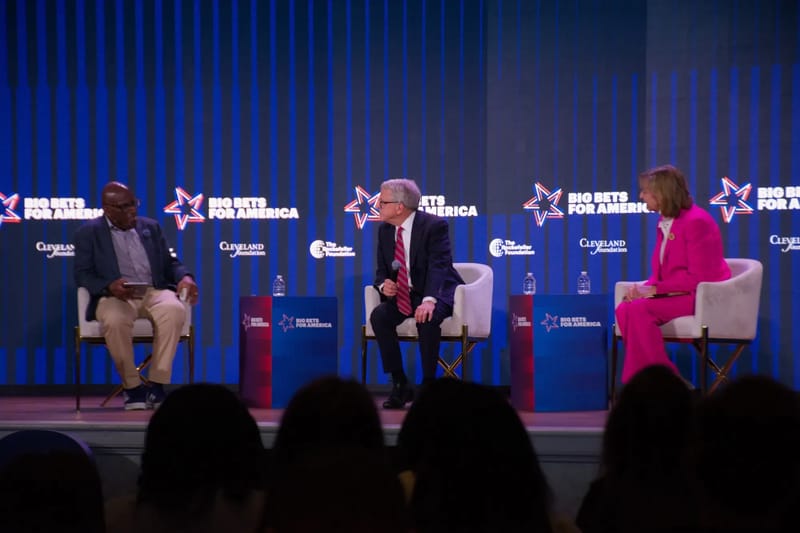 Ohio Gov. Mike DeWine and First Lady Fran DeWIne talk with NBC host Al Roker at the Rockefeller Foundation's Big Bets for America summit in Cleveland. (Photo: Nick Castele/Signal Ohio)