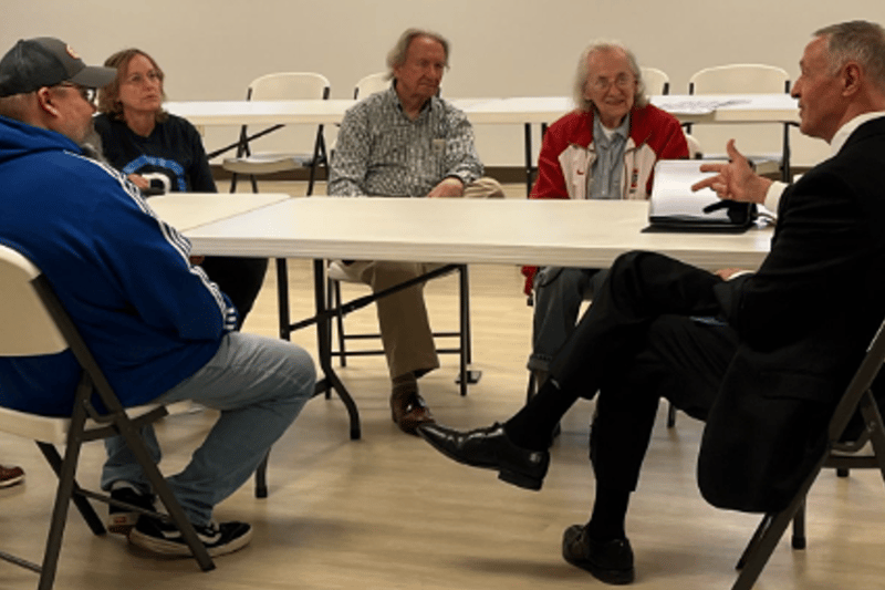 Former Social Security Commissioner Martin O’Malley, right, speaks with participants during a Social Security roundtable in Toledo on Friday, Sept. 25, 2026. O’Malley joined the Ohio Alliance for Retired Americans, Ohio AFL-CIO and AFSCME Local 8 to discuss Vivek Ramaswamy’s past statements supporting consideration of Social Security privatization and investment of Social Security money in the stock market.