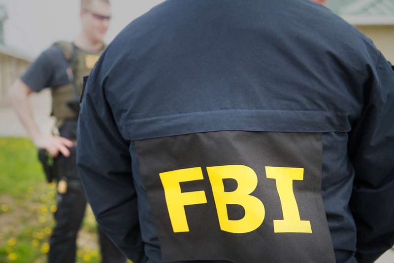 The back of an FBI agent. (Photo: Picryl/Public Domain)