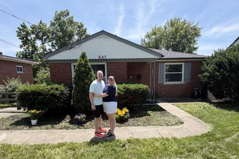 Ty and Allisha Setty pose with the two-bedroom house in suburban Cincinnati they bought in May for $170,000. Unlike many new homebuyers, the couple didn't need family help with the purchase. (Photo courtesy of Ty and Allisha Setty)