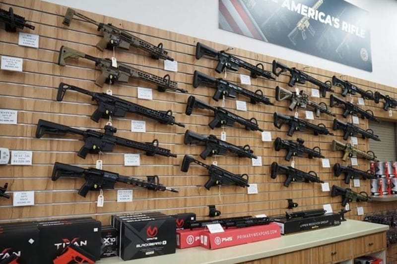 Firearms for sale are displayed at the Centennial Gun Club in Centennial, Colo., in June 2026. Nearly 45,000 people died from firearm-related injuries in 2024, down about 5% from the previous year, according to a new analysis of CDC mortality data. (Photo by Sara Wilson/Colorado Newsline)