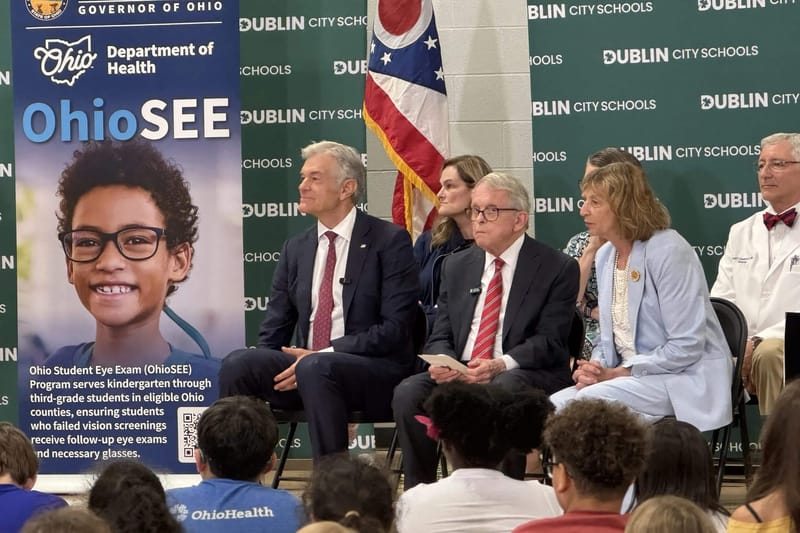 Gov. Mike DeWine (second from left) and Centers for Medicare & Medicaid Services Administrator Dr. Mehmet Oz (left) sit in Hopewell Elementary in Dublin on Tuesday, May 26, 2026. Credit: Andrew Tobias / Signal Ohio