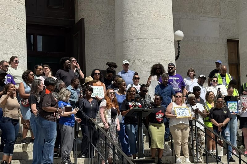 Ohio Organizing Collaborative officials and supporters hold a rally on the steps of the Ohio Statehouse on June 24, 2026. (Photo: Andrew Tobias / Signal Statewide)