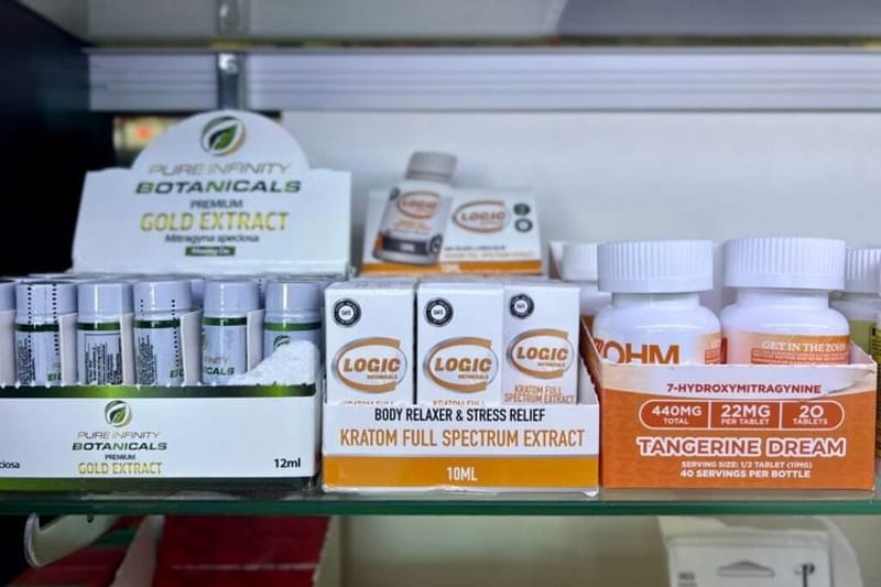 Liquid kratom extracts and capsules containing 7-OH are displayed for sale at a smoke shop in Buffalo, N.Y. A growing market is prompting state lawmakers to reconsider how the substance should be regulated. (Photo by Amanda Watford/Stateline)