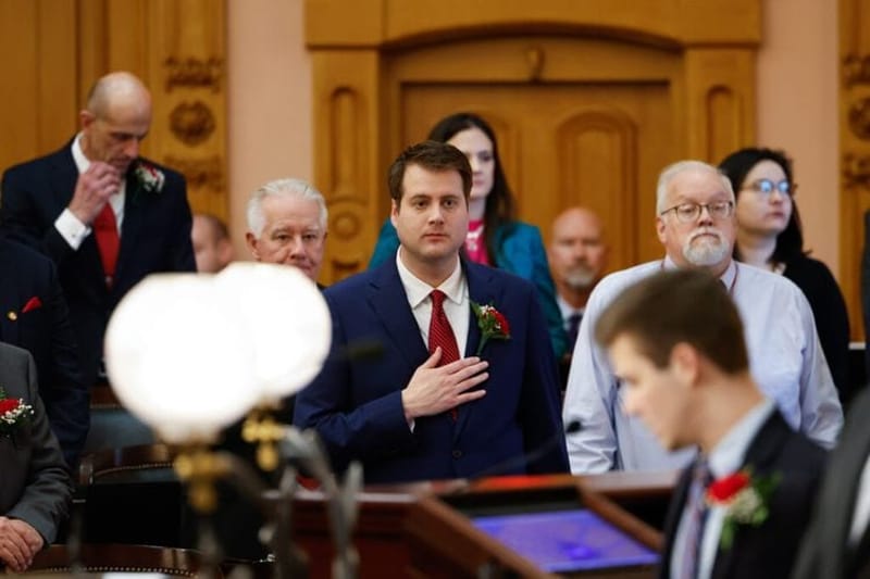 COLUMBUS, OH — JANUARY 03: Rep. Derek Merrin (R-Moclova Township) (center) during the Pledge of Allegiance at the opening day ceremonies of the 135th General Assembly of the State of Ohio, January 3, 2023, in the House Chamber at the Ohio Statehouse in Columbus, Ohio. (Photo by Graham Stokes for Ohio Capital Journal)