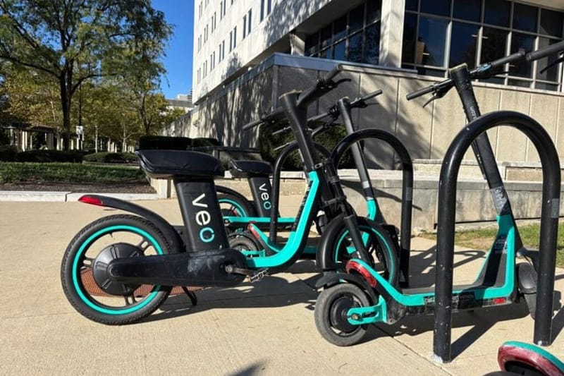 Electric bikes and electric scooters in Columbus, Ohio. (Photo by Megan Henry, Ohio Capital Journal).