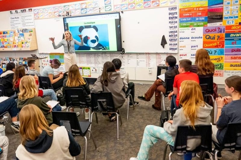 Students work in a classroom. (Photo by Spenser Heaps, States Newsroom.)