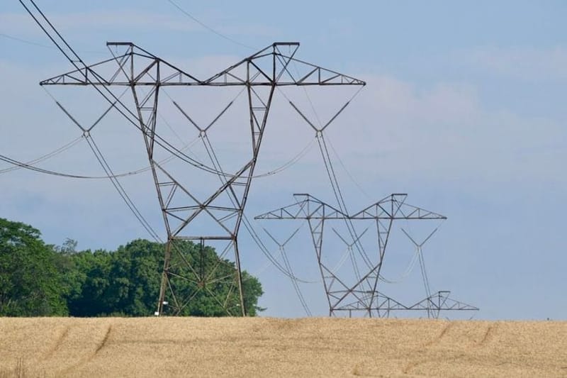 Power lines cross a field in Snyder County, Pennsylvania. (Photo by Peter Hall/Capital-Star)