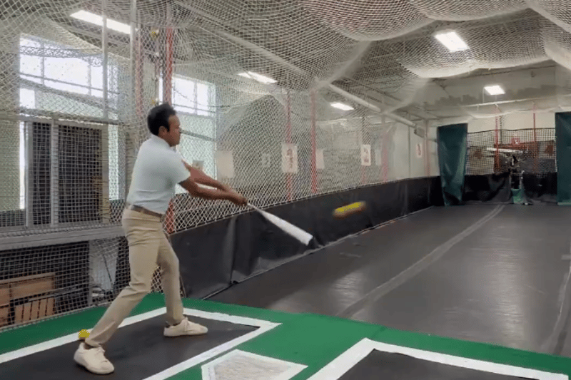 Vivek Ramaswamy takes a swing in a now-deleted campaign video filmed at a batting cage. An eyewitness who said he watched the filming says Ramaswamy’s team selected the slowest pitching setting and that the candidate made contact on just five of 25 pitches before the campaign recycled those swings in the finished video. (Photo: Instagram)