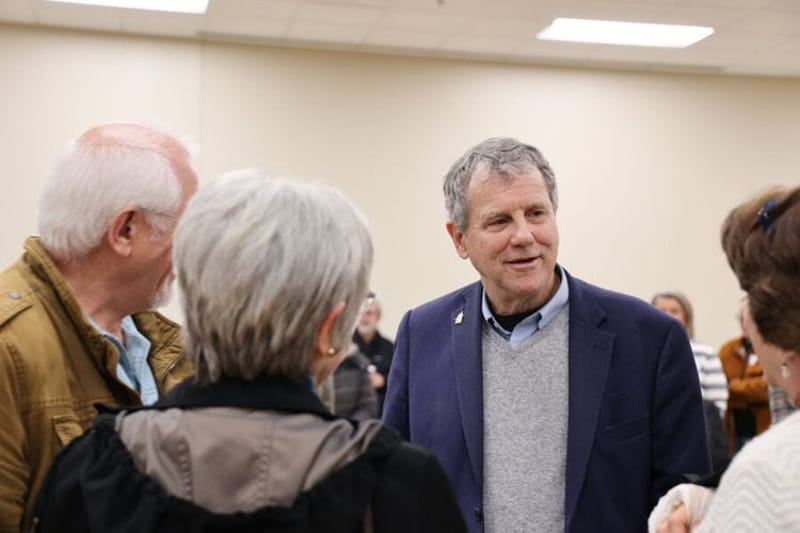 Sherrod Brown speaking with voters. (Photo: Facebook)