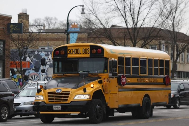 A school bus stops at a south Minneapolis intersection in January 2025. (Ellen Schmidt/Minnesota Reformer)
