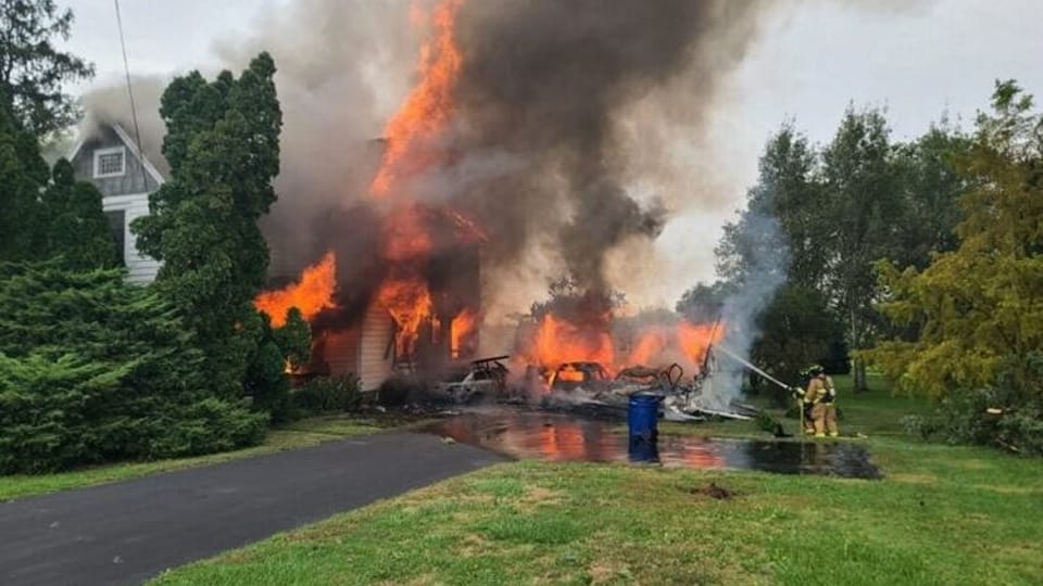Two hospitalized after car crashes into Seneca County home, igniting fire