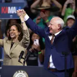 A former high school football coach rises to running mate as Walz accepts VP nomination