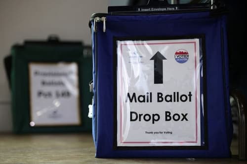 Trump signs order seeking to curb vote-by-mail in bid to control state election laws